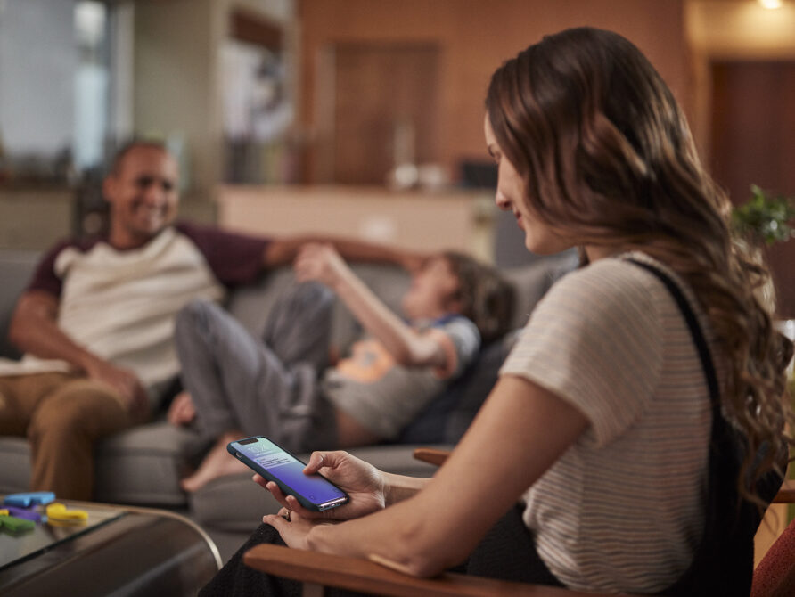 Woman using smartphone to access health information