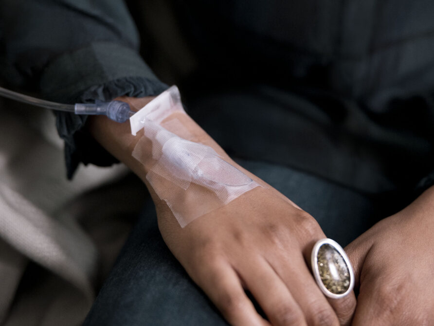 Patient's hand with IV tube