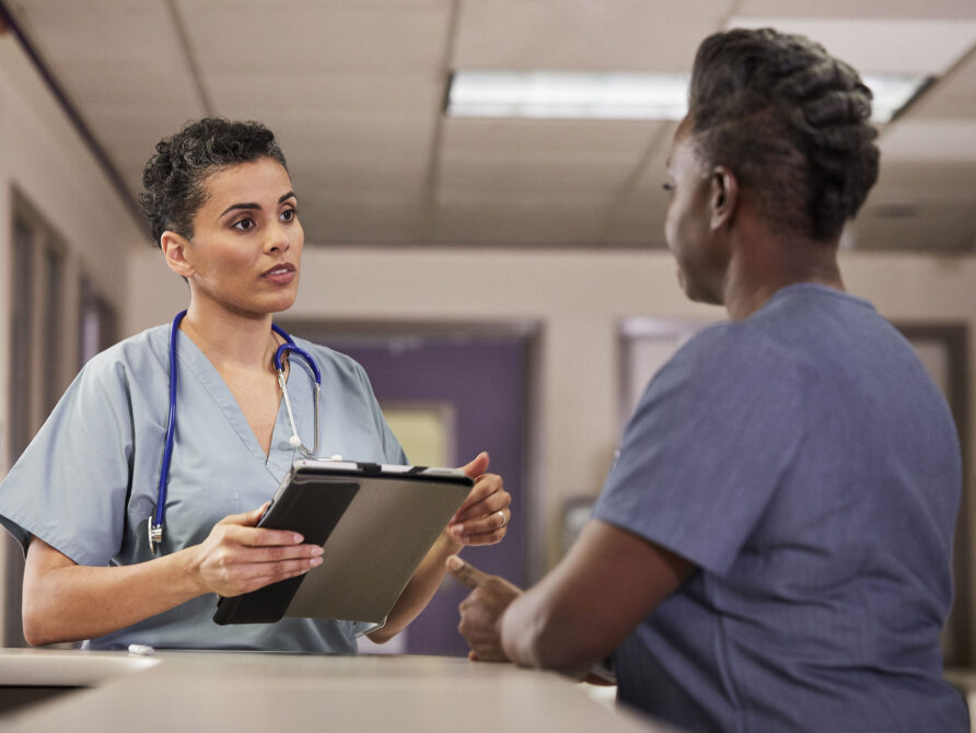 Image of doctor engaging with nurse