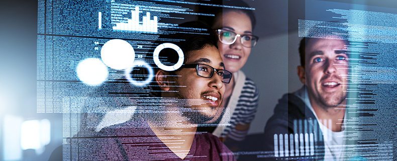 3 individuals looking at screen