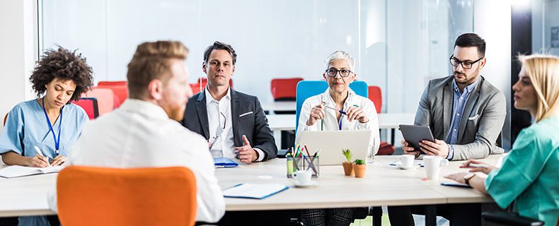 Medical experts and healthcare professionals having a meeting.