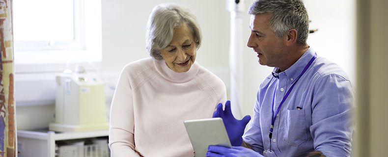 Doctor talking to a patient.