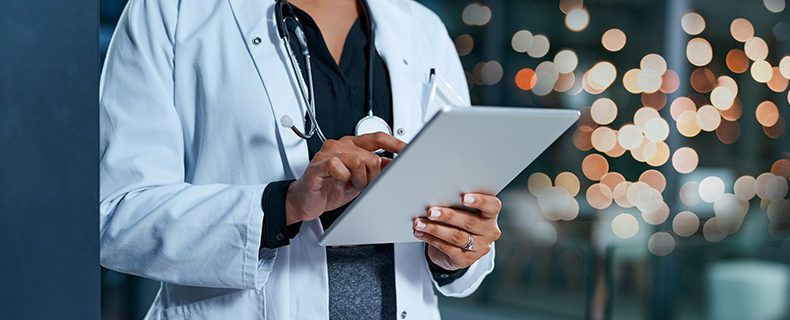 Doctor works within EHR applications