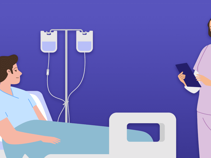 Clinician at patient bedside using EHR software on tablet