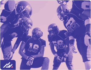 football players huddled together