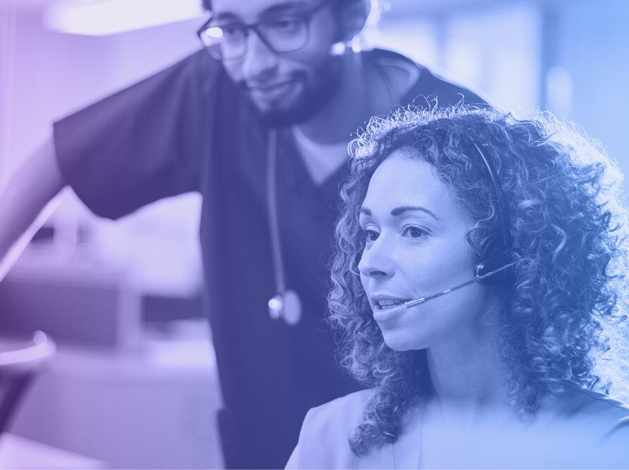 doctors looking at EHRs on computer