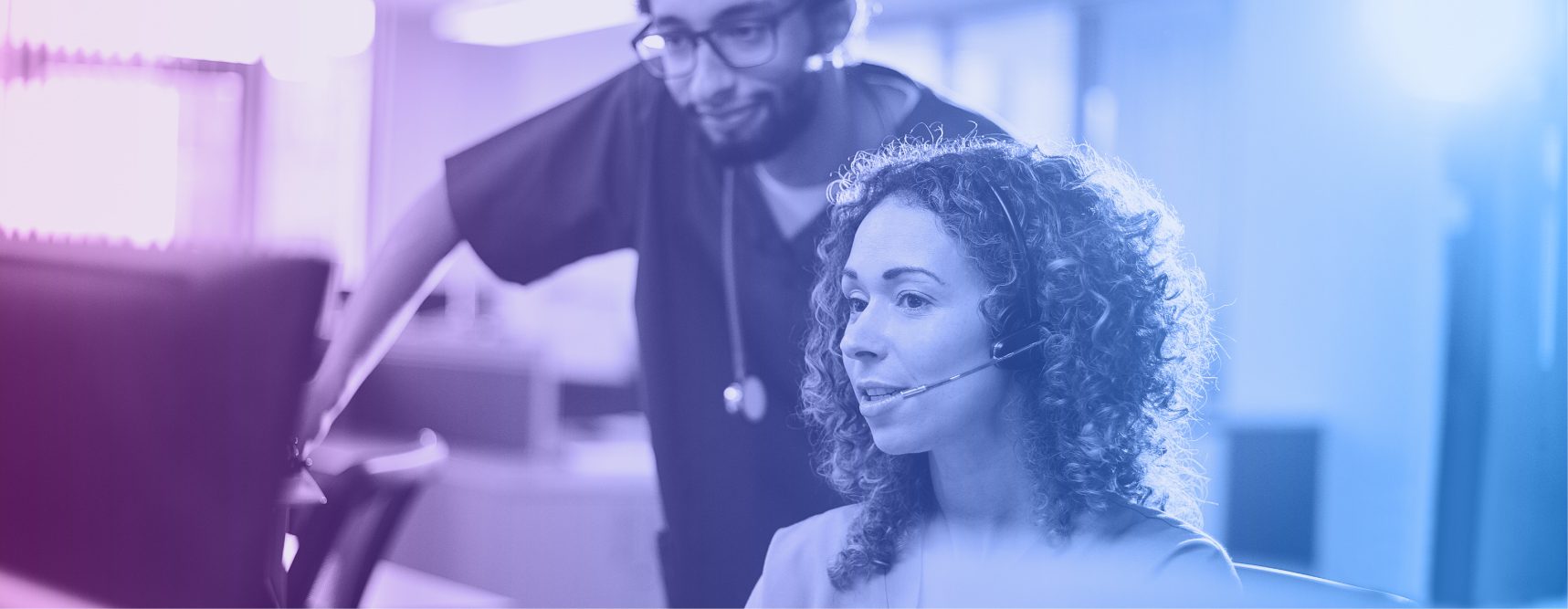 doctors looking at EHRs on computer