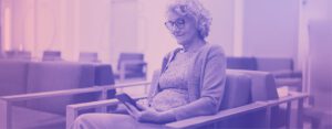 woman on phone in hospital waiting room