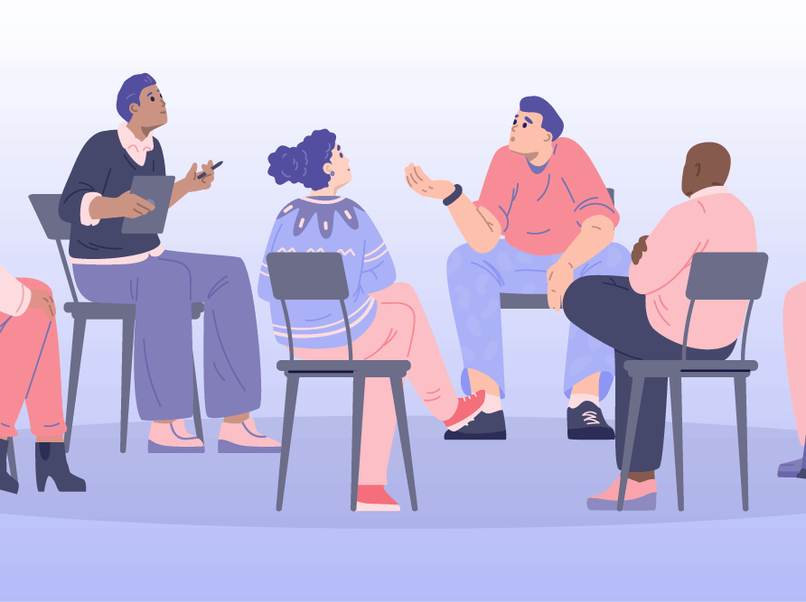 group of individuals sitting in a circle