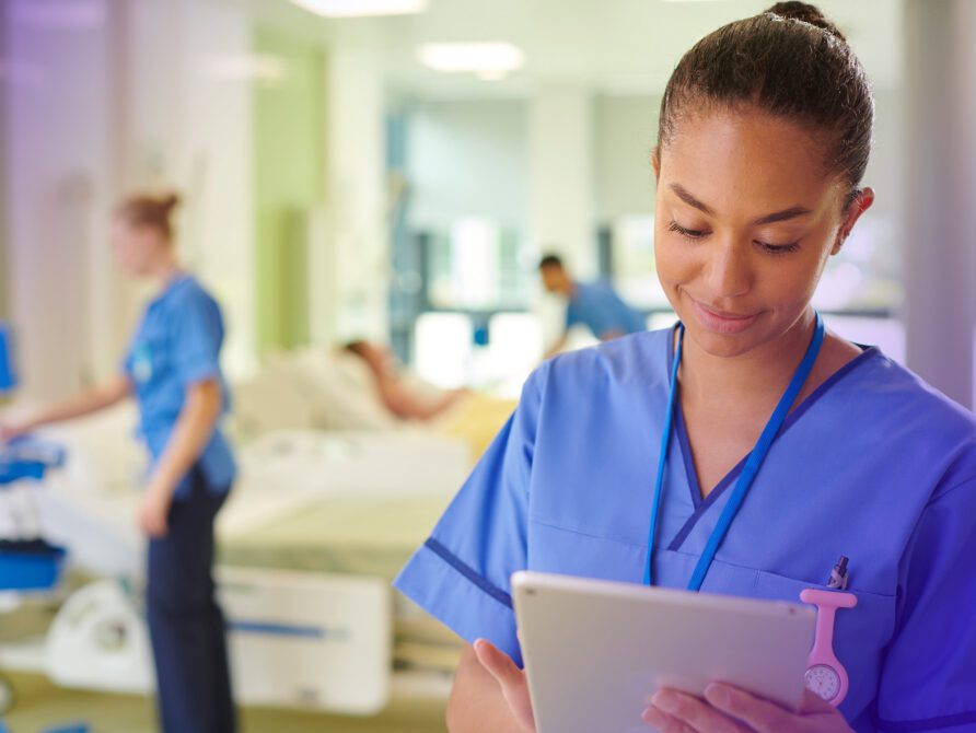 Nurse looking at tablet