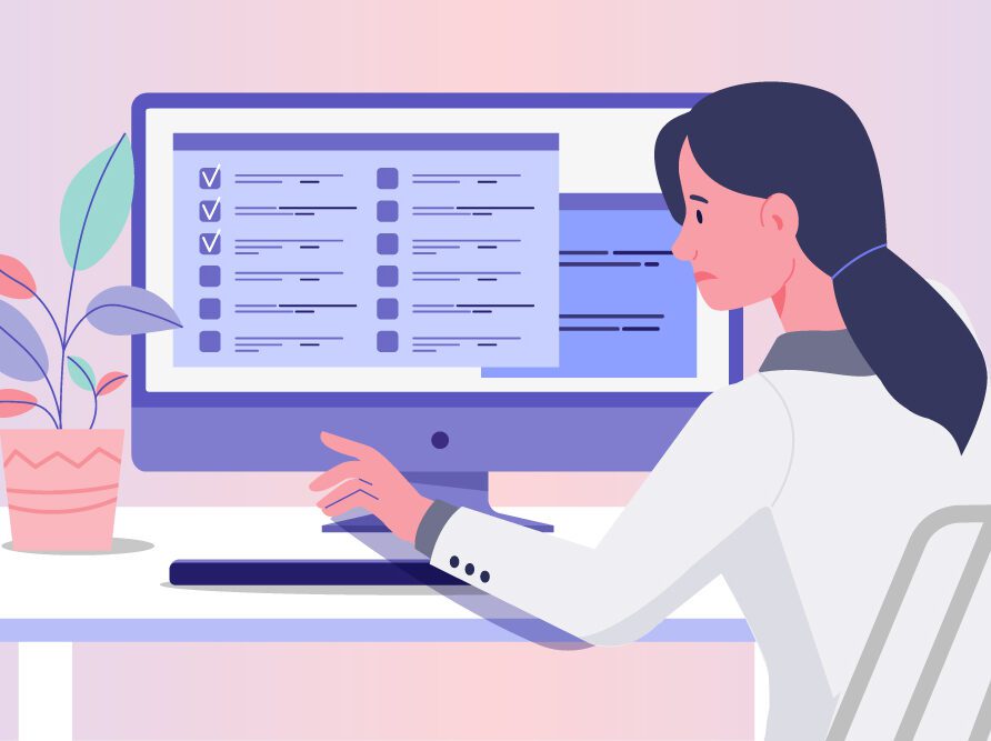 Clinician at computer using EHR
