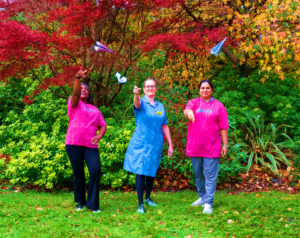 Paper planes made by young patients symbolising saying bye to paper documentation