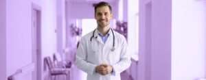 Clinician in front of purple background